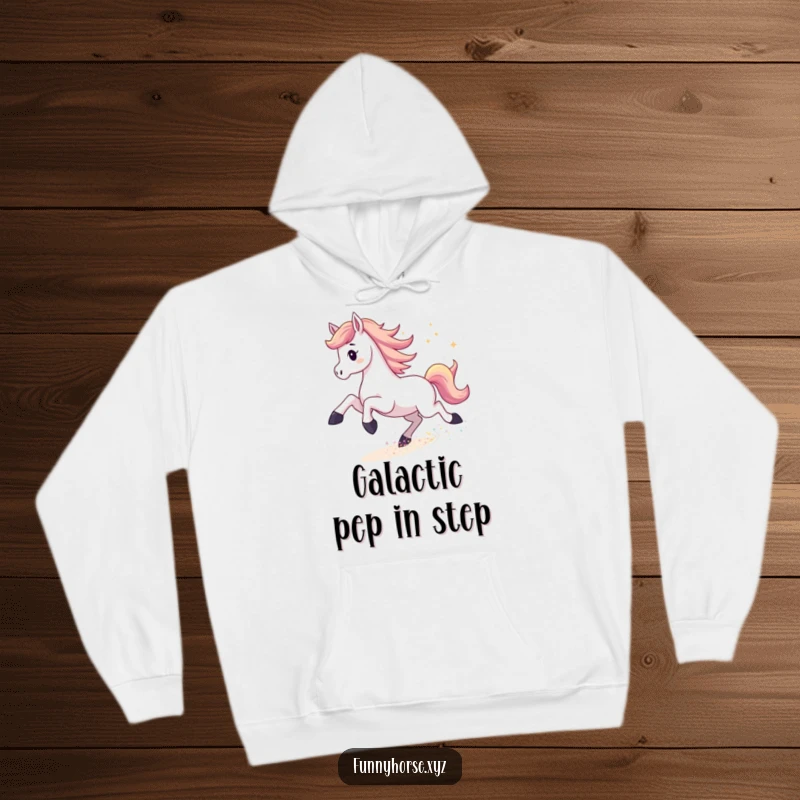 Funny hoodie illustrating an energetic horse kicking up a trail of shimmering stardust, providing warmth and cosmic flair humorously.