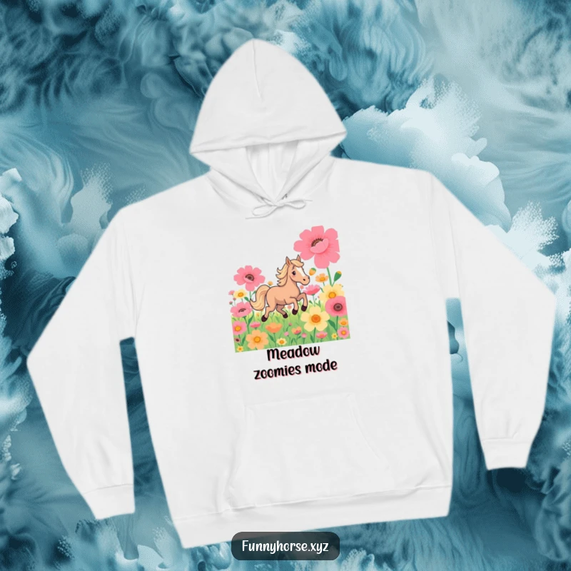 Funny hoodie: A playful horse joyfully gallops through a field of vibrant, oversized flowers, radiating energetic freedom.