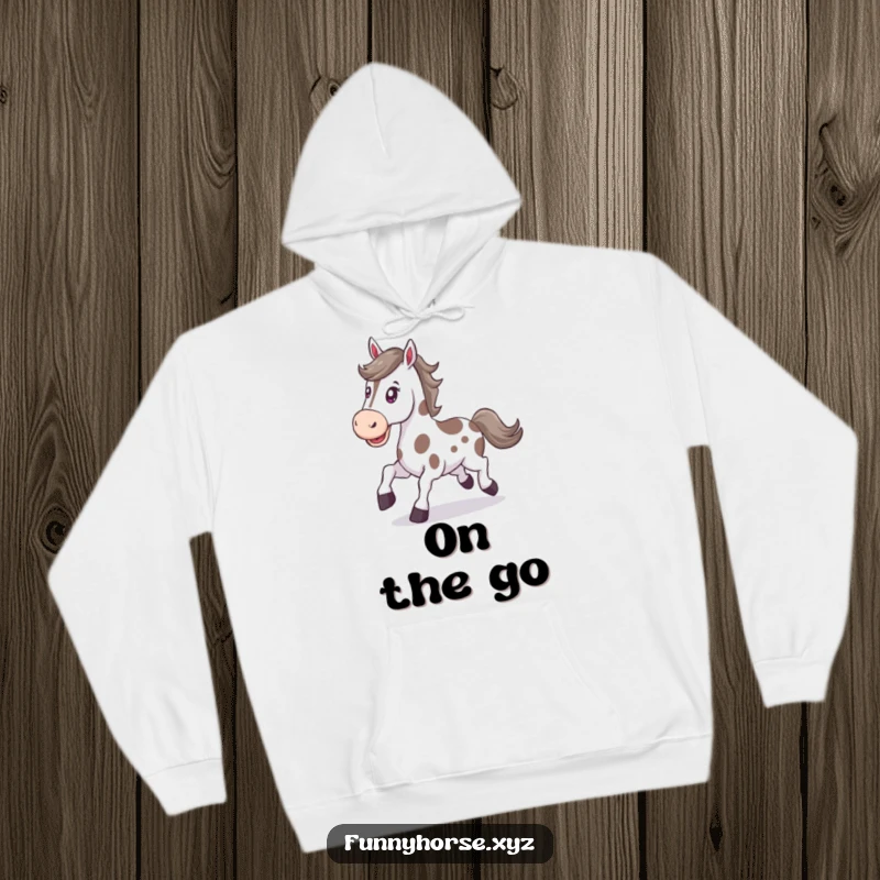 Funny happy spotted horse with a determined expression trots energetically, a warm and humorous hoodie for achievers.